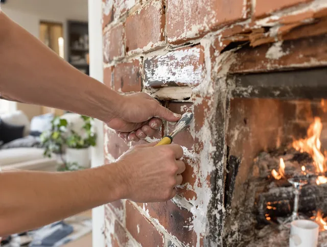 Routine fireplace repair by Seven Hills Chimney Sweep in Seven Hills, OH